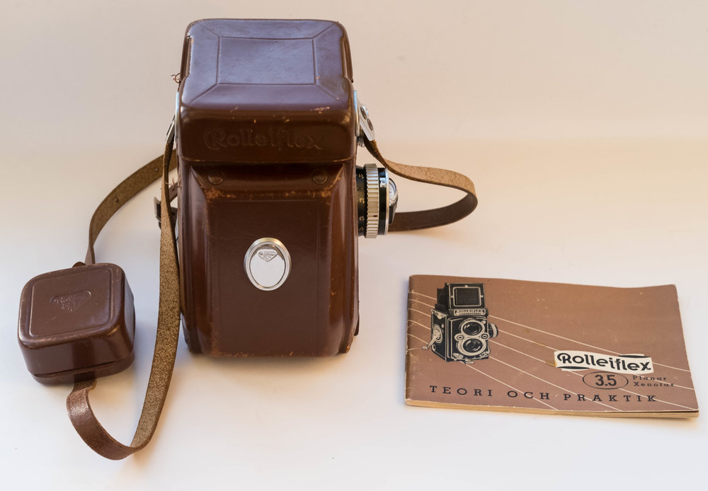   The camera itself was in superb cosmetic and mechanical condition. I also got a leather case with the auction lot, but, in truth, and unlike the camera, it was not in very good shape. In this photo the camera is holding the case on. The little pouch on the strap contained a lens hood and a filter but none of these was the right bayonet fit. Rolleiflex cameras have a bewildering range of bayonet fits for such accessories. I have some Rollei filters in a drawer, but I have not tried them on, as I don’t really believe in using filters on any type of lens. The real gem here is the strap with what I can only describe as a ‘scissors bayonet’, which can be clipped in and out very quickly. It beats most of the nonsensical rings on straps I have seen. I don’t know why it did not catch on. Perhaps, it is something to do with the shapes of camera bodies. On the right is the camera manual, which in this case is in Swedish. Fortunately, the manual can be downloaded from the  Orphan Cameras  website. Mike Butkus, the owner of the site, quite rightly expects a small contribution for downloads.  